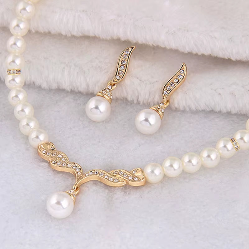 Elegant Gold Pearl Jewelry necklace Set (طقم مجوهرات ذهبي أنيق باللؤلؤ - مثالي للعرائس)